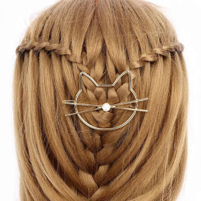 Goldene Haarspange mit Katzenkopf und Perle
